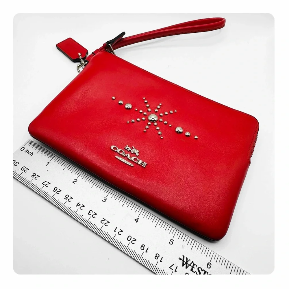 β
Coach RARE Western Rivets Wristlet - Red/Silver β
- Picture 14 of 16